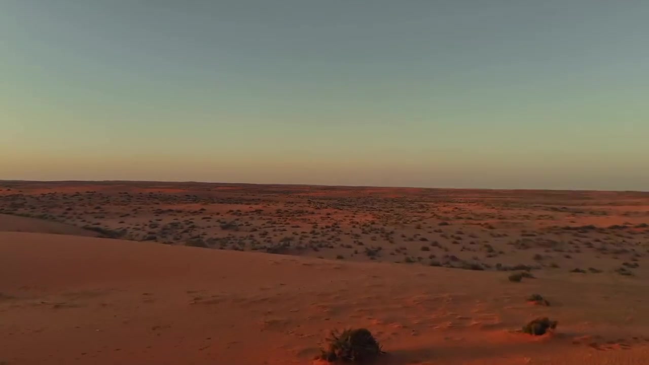 An empty desert landscape in warm evening light